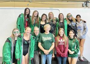 The Port Angeles girls swim team finished third at this weekends bidistrict championships. Top row, from left, Danika Asgeirsson, Amayah Nelson, Yau Fu, Harper McGuire, Lynzee Reid, Emerson DuBois, Olivia Mesen. Bottom row, from left, Brooke St. Luise, Lizzy Shaw, head coach Sally Cole, assistant coach Lisa Walls, Chloe Kay-Sanders, Erin DeMarco. (Courtesy photo)