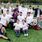 Forks FC celebrates its fifth-straight Peninsula College coed league championship. Forks won with a 7-1 victory over High Energy Metals at Wally Sigmar Field on Sunday. (Peninsula College)
