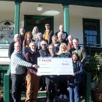 First Fed presents a charitable donation to the board and staff at Centrum in honor of the arts non-profits 50th anniversary in Port Townsend. Pictured, front row, left to right, are Centrum Executive Director Robert Birman, Centrum Board Chair Scott Wilson, First Fed Board Member Norm Tonina, First Fed Port Townsend Branch Manager Luxmi Love; second row, left to right: Walter Parsons, Katy Goodman, Catharine Robinson, Sara Spalding, John Murock; third row, left to right: Kris Easterday, Renee Klein, Leah Mitchell, Robert Alexander, Sam Shoen; fourth row, left to right: David Rinn, Jeanie Cardon, Andy Fallat and Malcolm Harris.