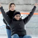 Sharmaine Wright of Port Angeles expresses delight while being pushed by her daughter, Kaylee Konopaski, 10, on the ice at the Port Angeles Winter Ice Village on Saturday. The village, which features a temporary ice skating rink, opened Friday and will operate daily from noon to 9 p.m. through Jan. 2. (Keith Thorpe/Peninsula Daily News)