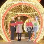 Singers, from left, Abbigail Cuellar, 16, Danielle Lorentzen of Ghostlight Productions, Kaylyn Stroup, 15, and Max MacFall, 15, perform a Christmas carol during Wednesday evenings opening ceremony for the 33rd annual Festival of Trees at Vern Burton Community Center in Port Angeles. (Keith Thorpe/Peninsula Daily News)