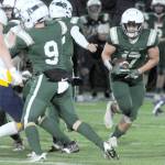 Port Angeles Jason Hawes, (17), picks an opening in the in the line against Bainbridge at Port Angeles Civic Field. Hawes led the team in tackles, return yardage and ran for 700 yards from scrimmage. (Keith Thorpe/Peninsula Daily News)