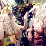 Emily McAlily, in the part of Chandon, left, toys with the wig of Steve Methner, playing the role of King Triton, prior to a Tuesday rehearsal of the PA Panto production of Ethel Mermaid and the Varying Degrees of Evil, which starts this weekend at Peninsula College. (Keith Thorpe/Peninsula Daily News)