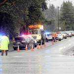 Traffic backs up on Monroe Road because of an automobile wreck near the intersection with U.S. Highway 101 on Thursday. (Keith Thorpe/Peninsula Daily News)
