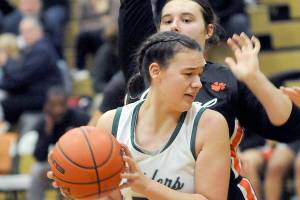 KEITH THORPE/PENINSULA DAILY NEWS
Port Angeles' Lexie Smith, front, looks for away around Central Kitsap's Sam Schaeffer on Saturday in Port Angeles.