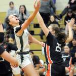 Port Angeles Lindsay Smith puts up a shot over the head of Central Kitsaps Sonora Manchester on Saturday evening at Port Angeles High School. (Keith Thorpe/Peninsula Daily News)