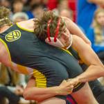 East Jeffersons Grady White, white ear protectors, takes down Vashons Michael Ryland during the East Jefferson Invitational held Saturday at Port Townsend. (Steve Mullensky/for Peninsula Daily News)