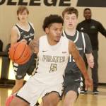 Peninsula Colleges Javon Ervin (5) drives the ball against Green River on Saturday in Port Angeles. Green River won 78-58. (Dave Logan/for Peninsula Daily News)