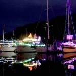 The Port Angeles Boat Haven is all aglow with holiday lights on various boats. Temperatures on the North Olympic Peninsula are forecast to be in the mid- to upper 40s this week with overnight lows dipping into the upper 30s. (Dave Logan/for Peninsula Daily News)