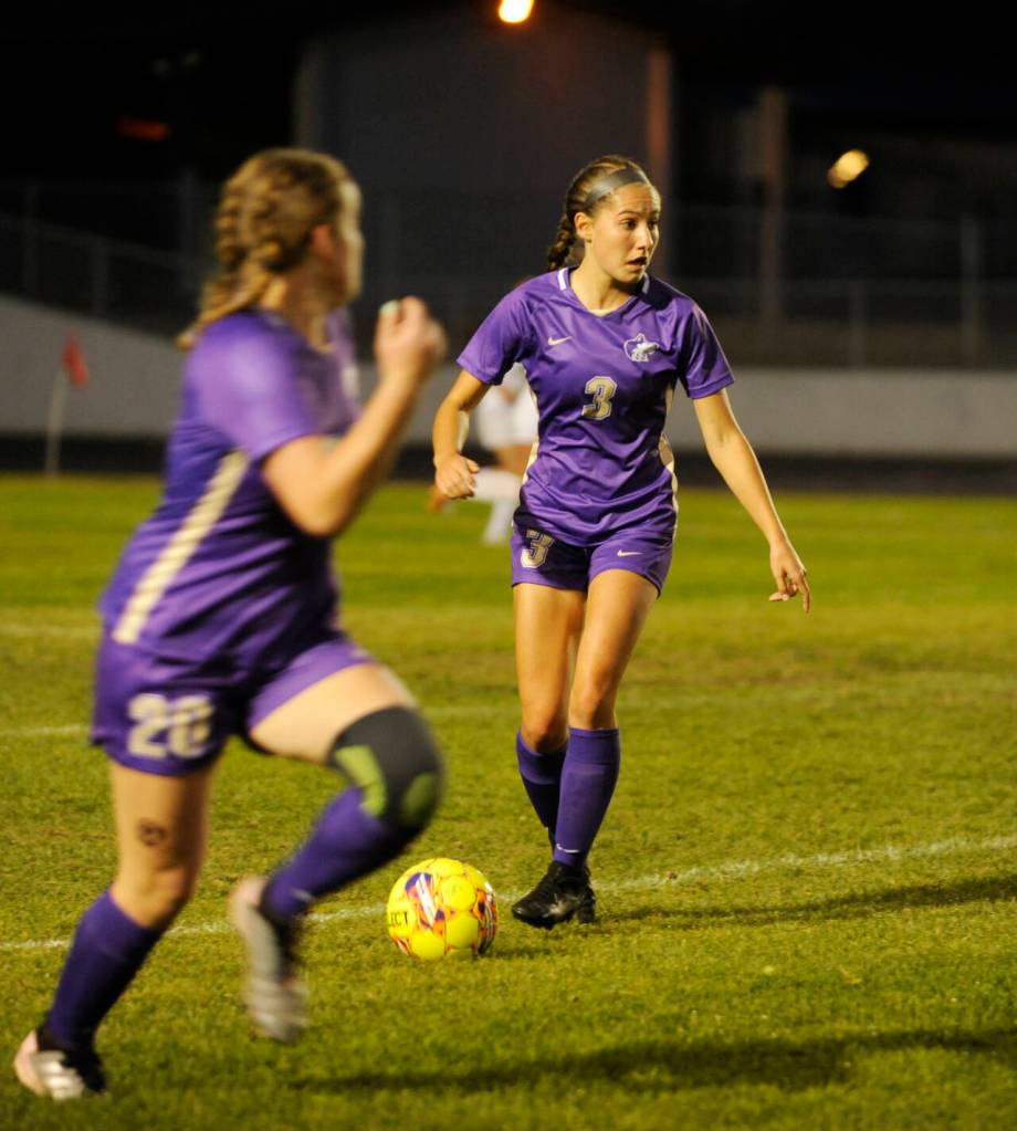 Sequims Taryn Johnson, right, pushes the ball upfield in the second half of a Sept. 26 Olympic League home game against Bainbridge. Johnson has been selected as the Peninsula Daily News All-Peninsula Girls Soccer MVP for the second straight season.
Michael Dashiell/Olympic Peninsula News Group