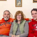 The McKenzie family, Ian, Lori and son Joshua, at home in Port Townsend on Thursday. (Steve Mullensky/for Peninsula Daily News)