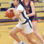 KEITH THORPE/PENINSULA DAILY NEWS
Port Angeles' Kenzie Moses, front, drives past Washougal's Avery Dixson on Thursday in Port Angeles.