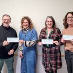 Pictured from left to right are Marty Brewer, Port Angeles School District superintendent; Michelle Turner, Port Angeles Education Foundation president; Michell Gentry, Port Angeles AmeriCorps coordinator; and Kayla Oakes, Field Arts and Events Hall.