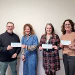 Pictured, left to right, are Marty Brewer, Port Angeles School District superintendent; Michelle Turner, Port Angeles Education Foundation president; Michell Gentry, Port Angeles AmeriCorps coordinator; and Kayla Oakes, Field Arts and Events Hall.