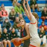 East Jeffersons Kateyn Riley keeps her eyes on the basket while being closely guarded against Washougal on Saturday in Chimacum. (Steve Mullensky/for Peninsula Daily News)