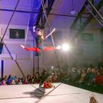 Juliane Hall of Seattle performs acrobatics on the straps during the First Night circus on Sunday at the American Legion Hall in Port Townsend. The Production Alliance created an all-ages experience for New Years Eve. (Steve Mullensky/for Peninsula Daily News)