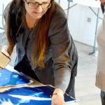 Teaching artist Dana Weir, pictured teaching an art camp last summer, will guide Meet Me at the Gallery, a new Northwind Art School class Jan. 16. (photo courtesy Northwind Art)