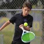 Sequim freshman Garrett Little, pictured here returning a shot against a North Mason foe on May 10, comes into the season the Wolves top singles player. (Michael Dashiell/Olympic Peninsula News Group)