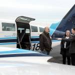 KEITH THORPE/PENINSULA DAILY NEWS
Clint Ostler, president of Dash Air Shuttle, right, points out features of the Cessna 402C aircraft to Peter Metz, left, and Kim Reynolds, both of Port Angeles, during an open house for the air service on Tuesday at William R. Fairchild International Airport in Port Angeles.