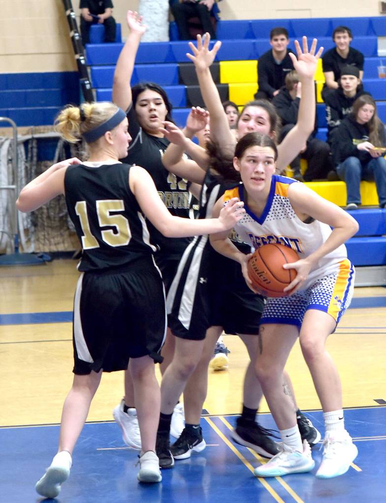 Crescents Chloe Ferro-May, right, looks for help in a crowd of Clallam Bay defenders, including, from left, Brielei Hull, Jasmine Tinoco and Simona Cruz-Lopez on Tuesday at Crescent High School. (Keith Thorpe/Peninsula Daily News)