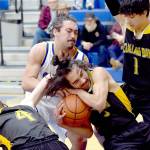 KEITH THORPE/PENINSULA DAILY NEWS 
Crescent's Peyton Watson fights for the ball with Clallam Bay's Parker Prater, center, as Prater's teammates, from left, Dylan Simmons, Mauncio Cruz-Lopez and William Hull try to avoid the fray on Tuesday night in Joyce.