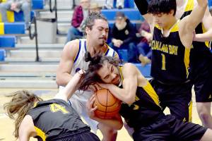 KEITH THORPE/PENINSULA DAILY NEWS 
Crescent's Peyton Watson fights for the ball with Clallam Bay's Parker Prater, center, as Prater's teammates, from left, Dylan Simmons, Mauncio Cruz-Lopez and William Hull try to avoid the fray on Tuesday night in Joyce.