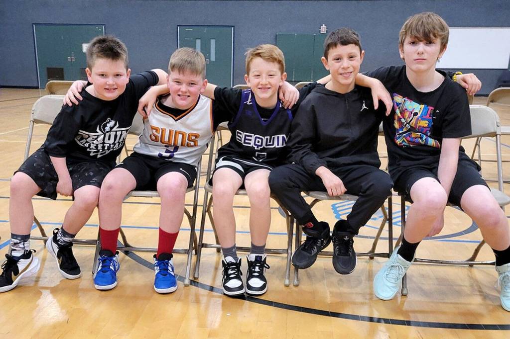 Snow and ice may have forced a delay but the Sequim Elks Lodge recently held its National Hoop Shoot competition at the Sequim Boys & Girls Club. Contestants included, from left, Bennett Castell, Grayson Castell, Roman Bacchus, Maks Lopez and Luca Blake. 
Bennett Castle won the 8-9 age bracket, Bacchus the 10-11 division and Blake the 12-13 group and all three will compete at the district-level of the National Hoop Shoot competition.