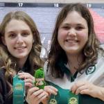 From left, Port Angeles Paige Pangaro and Abby Robinson both qualified for the girls state bowling tournament for the second straight year.