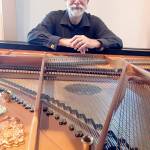 The Candlelight Concert this month will feature classical pianist Mike Carroll.