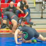 East Jefferson Rival grappler Manaseh Lanphear Ramirez tries to flip his Klahowya opponent Sean Price during the Nisqually League subregionals at Port Townsend High School on Saturday. Ramirez won the 150-pound weight class. (Steve Mullensky/for Peninsula Daily News)