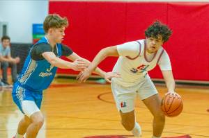 East Jeffersons Keidan Guzman drives the ball against Bellevue Christian on Friday. Guzman finished with 13 points, six assists and eight rebounds in the Rivals victory to keep them at .500 in the Nisqually League. (Steve Mullensky/for Peninsula Daily News)