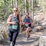 Peninsula Adventure Sports Olympic Adventure Trail run returns April 13. Here, Debbie Proctor of Vancouver (307) and Sherry Xiong of Port Angeles (343) run in the half-marathon of the OAT Run in 2021. (Matt Sagen/Cascadia Films)
