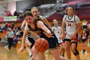 Jordan Nailon/ Daily News Forks Bailey Johnson tracks down a loose ball during the Spartans state regional sealing victory over Toledo in the Class 2B District IV Tournament Saturday at W.F. West High School.