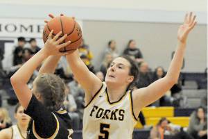 Forks Keira Johnson (5) was named the Pacific 2B League Most Valuable Player after leading her team to a 10-0 record in league this season. (Lonnie Archibald/for Peninsula Daily News)