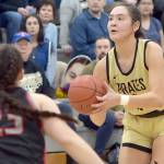 KEITH THORPE/PENINSULA DAILY NEWS
Peninsula's Jenilee Donovan sets up for a trey as Everett's Jada Andresen looks on during Saturday's home finale in Port Angeles.
