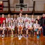 The Neah Bay girls basketball team is looking to win back-to-back state championships at the state tournament this weekend. From left, back row, is head coach Cherish Moss, assistant Cierra Knaus, Wiinuk Martin, Angel Halttunen, Ezrah Ray, Amber Swan, Ryana Moss, assistants Gina McCauley and Tony McCauley and manager Brooklynn Johnson. From left, sitting, are Brianna McGimpsey, Danica Halttunen, Qwaapeys Greene, Caylee Moss and Cerise Moss.