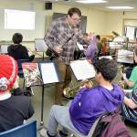 KEITH THORPE/PENINSULA DAILY NEWS
Music teacher Jesse Reynolds leads a sixth-grade band class through a song at Franklin School in Port Angeles.