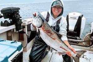 Janell McCullough caught this good-sized hatchery chinook while fishing off of Sekiu over the Marine Area 5 salmon opener last weekend.