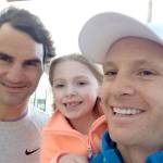 Port Angeles tennis star Jesse Schouten, at right, with his daughter and tennis legend Roger Federer. (Courtesy photo)
