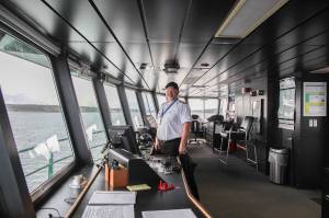 Luisa Loi / Whidbey News Group
Captain Mark Gripp smiles surrounded by the displays and controls in the Kennewicks pilothouse, moments before leaving Keystone Harbor.