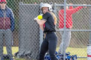 East Jefferson Rivals catcher Breanne Huntingford gets a walk to first base after being tagged by the ball while at bat during a game against the Bremerton Knights played at Blue Heron Middle School in Port Townsend on Wednesday. (Steve Mullensky/for Peninsula Daily News)