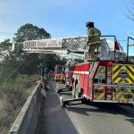 Members of East Jefferson Fire-Rescue rescued an injured driver who was ejected from their vehicle when it went over a cliff on South Discovery Road on Wednesday. (East Jefferson Fire Rescue)