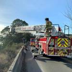 Members of East Jefferson Fire-Rescue rescued an injured driver who was ejected from their vehicle when it went over a cliff on South Discovery Road on Wednesday. (East Jefferson Fire Rescue)