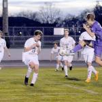 Matthew Nash/for Olympic Peninsula News Group
Sequim's Preston Kurtze puts a boot to the ball while surrounded by Port Angeles defenders' Grant Butterworth, Jackson Wyall, Myles Close, Aurelio Wilson-Rojero and Caleb Lagrange (obscured) during the Wolves' 4-2 win Thursday night.