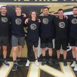 Members of 7 Cedars celebrate a Peninsula Basketball League title on March 17. Pictured are (from left) Jim Halberg, Dan Horton, Andrew Halberg, Dru Clark, Kyle Benedict, team captain Kasey Ulin, Gabe Long and Garrett Edwards.