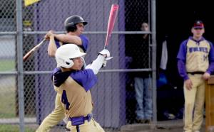 Michael Dashiell/Olympic Peninsula News Group
Sequims Bryant LaBoy laces a single into left field during the Wolves loss to North Kitsap on Thursday.