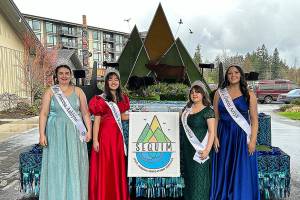 Sequim Irrigation Festival royalty, from left, Princess Ashlynn Northaven, Princess Kailah Blake, Princess Sophia Treece and Queen Ariya Goettling stand with their new float that theyll ride on for 14 parades this year. It was shown to them for the first time on Saturday at 7 Cedars Casino. (Matthew Nash/Olympic Peninsula News Group)