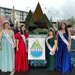 Sequim Irrigation Festival royalty, from left, Princess Ashlynn Northaven, Princess Kailah Blake, Princess Sophia Treece and Queen Ariya Goettling stand with their new float that theyll ride on for 14 parades this year. It was shown to them for the first time on Saturday at 7 Cedars Casino. (Matthew Nash/Olympic Peninsula News Group)