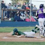 Port Angeles' Alex Angevine slides home safely against Sequim as catcher Ayden Holland waits for a throw. In the on-deck circle is Port Angeles' Ezra Townsend. (Dave Logan/for Peninsula Daily News)