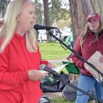 KEITH THORPE/PENINSULA DAILY NEWS
Retired teacher Nancy McCaleb speaks in support of striking paraeducators in the Port Angeles School District as Port Angeles Paraeducators Association President Rebecca Winters listens during a rally on Thursday at Shane Park.